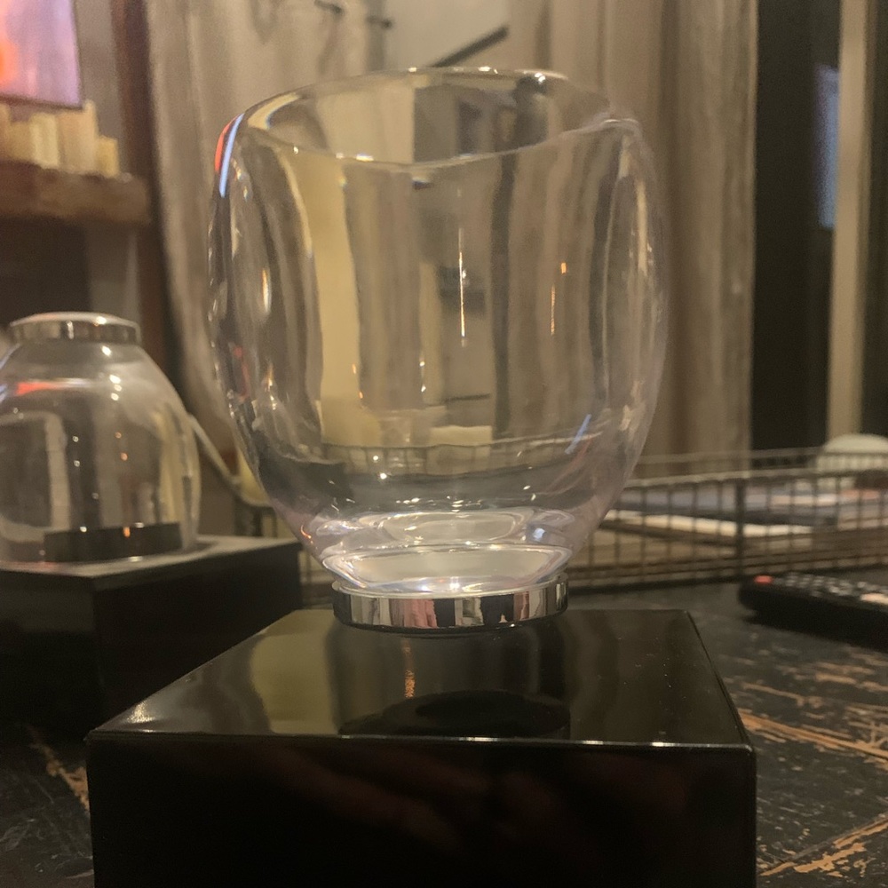 Two basically brand new levitatingx glasses with stands.